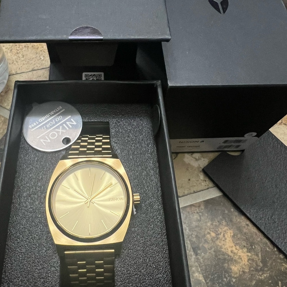 NIB Nixon Gold and Black Men's Watch